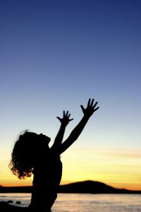 child-reaching-for-the-sky